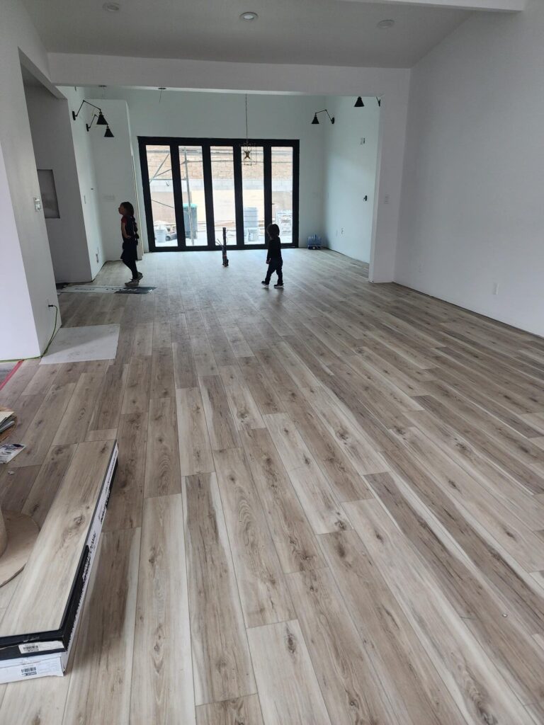 New flooring in an unfinished room