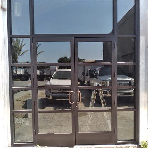 Black-framed glass entrance doors