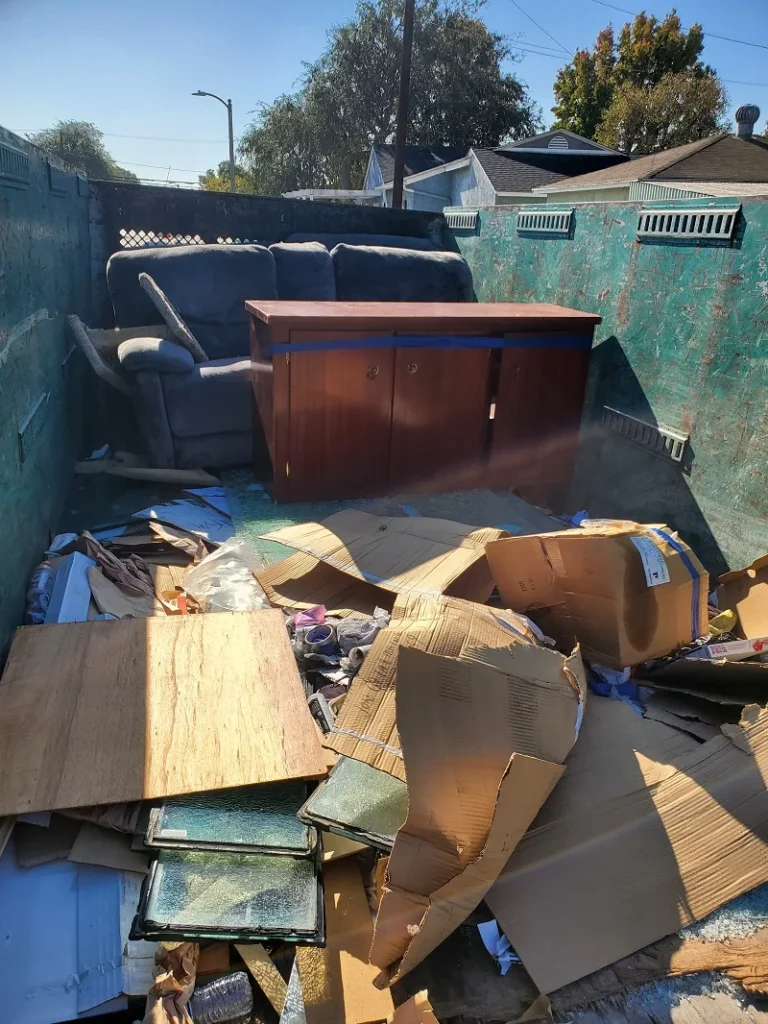 Discarded furniture and cardboard