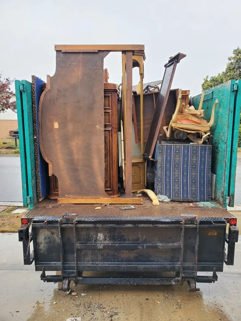 Hauling truck loaded with wood debris