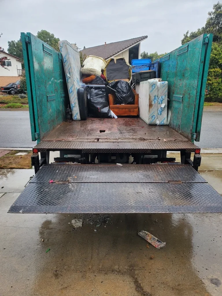 Hauling truck loaded with household items