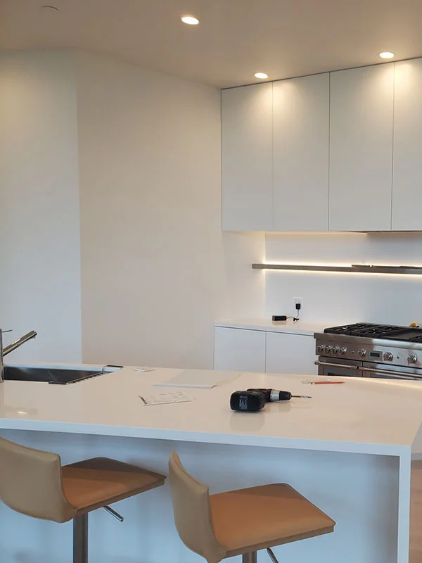 White kitchen with island seating